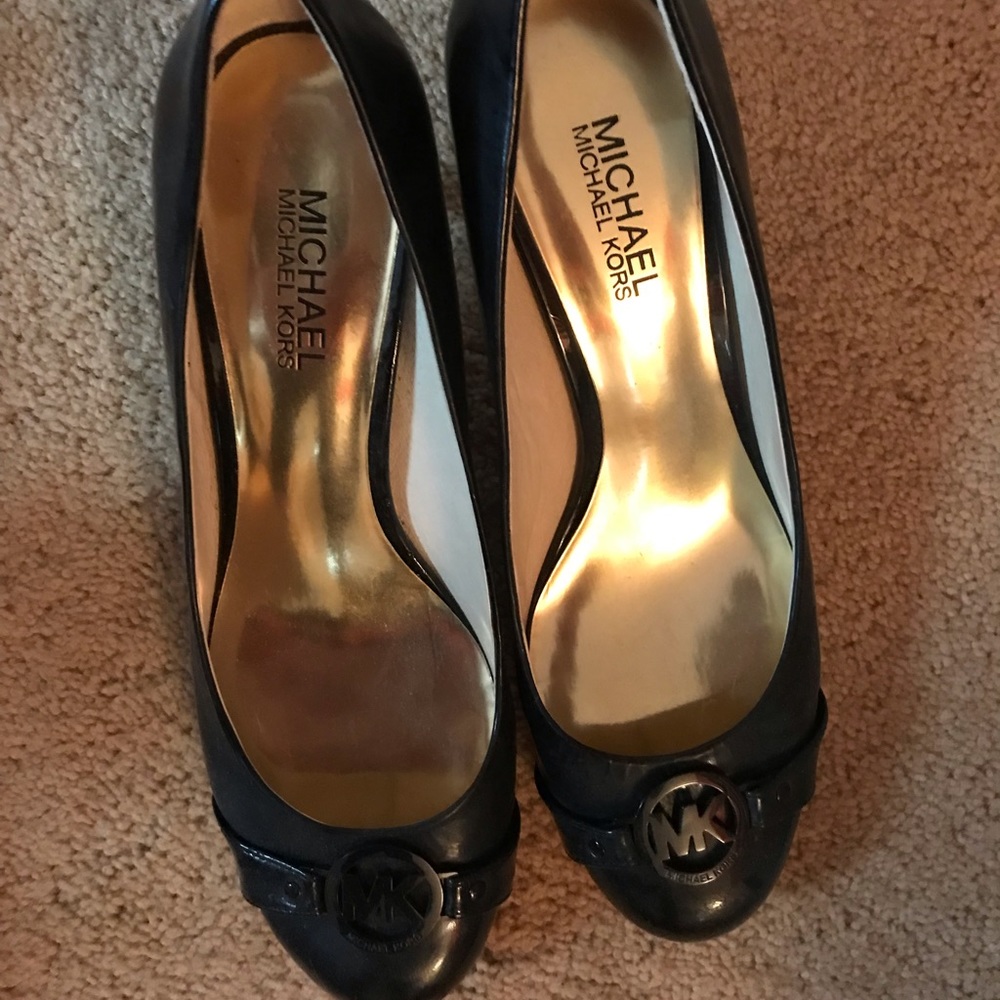 Michael Kors black patent pumps